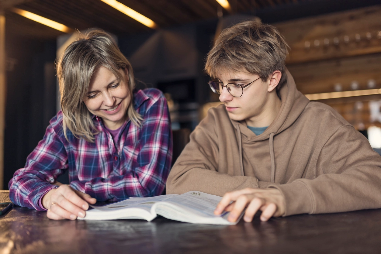 Pupil working with a tutor
