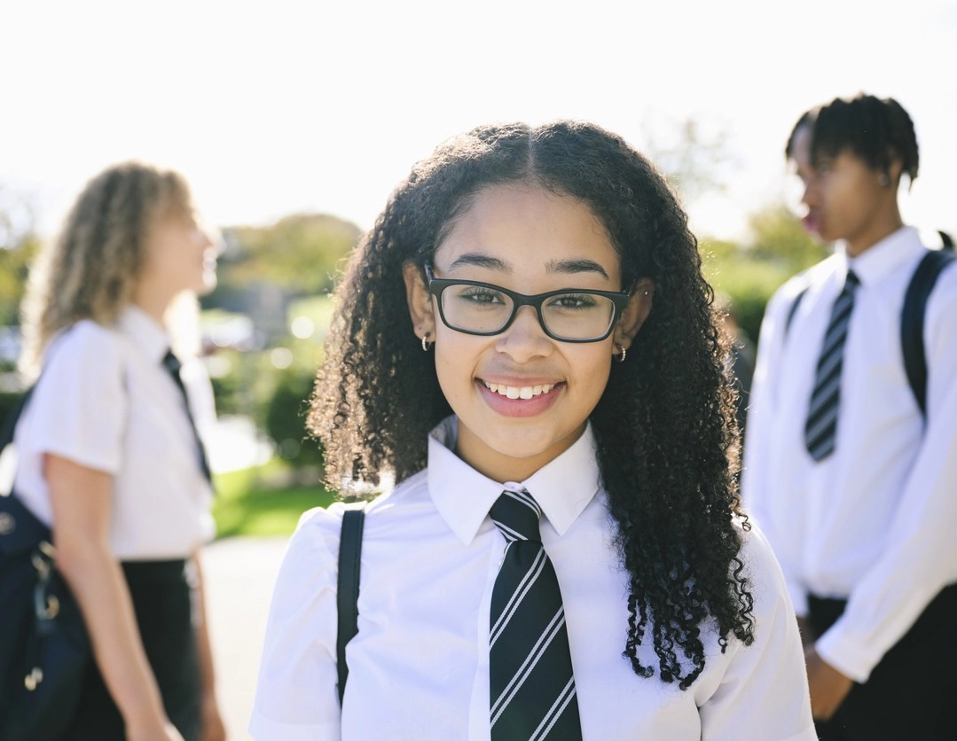 Tutor supporting a pupil