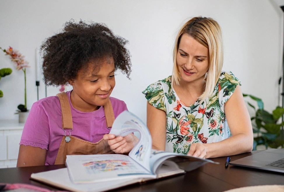 Tutor supporting a pupil